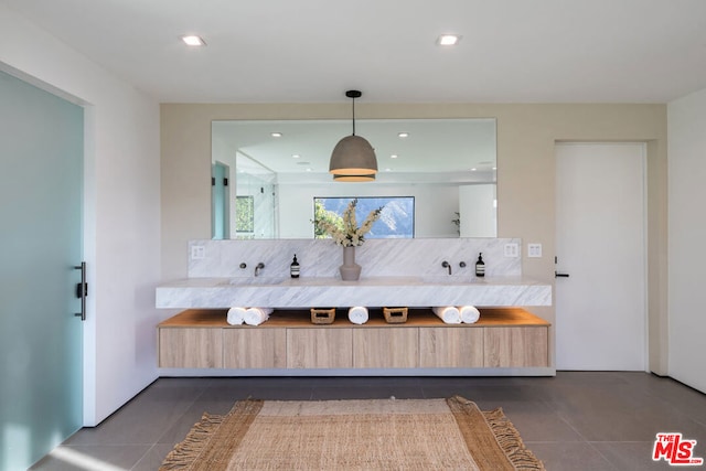 bathroom featuring tile patterned flooring and decorative backsplash