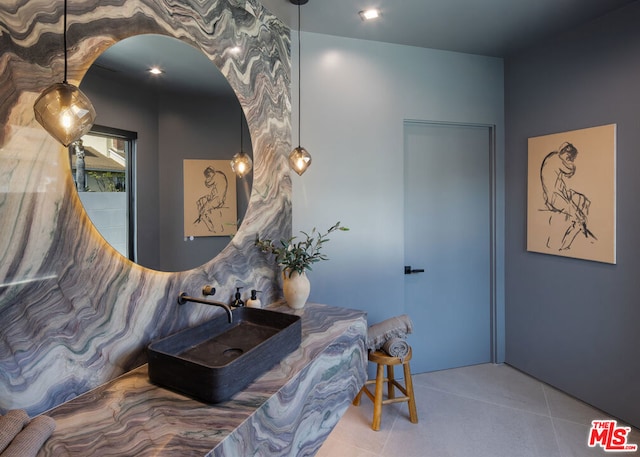 bathroom with tile patterned floors