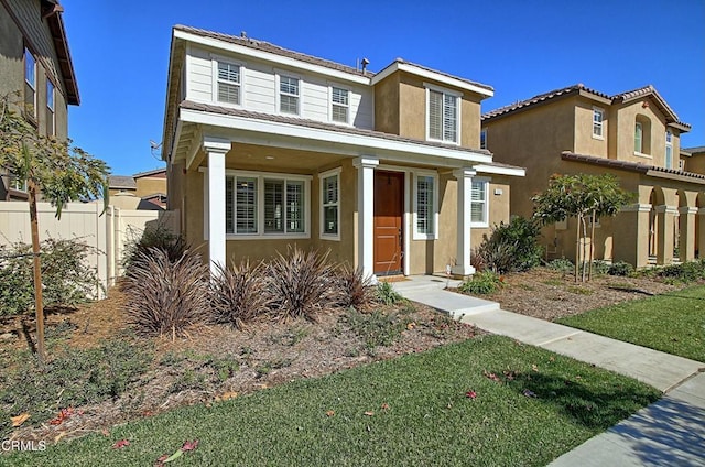 view of front facade with a front yard