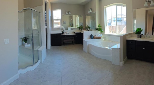 bathroom featuring vanity and shower with separate bathtub