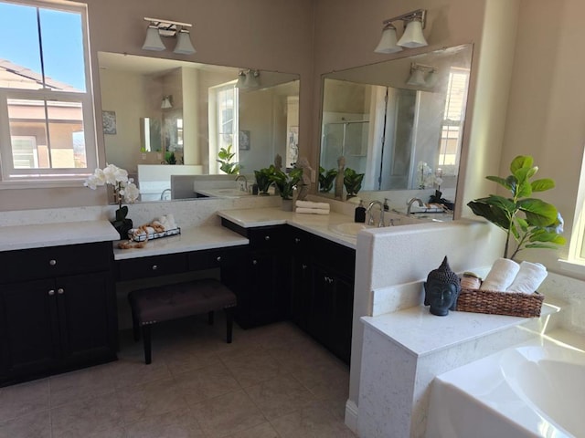 bathroom featuring tile patterned flooring, vanity, and independent shower and bath