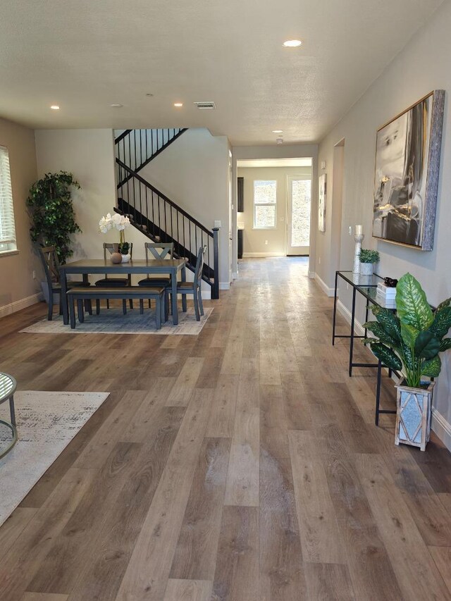 hall featuring wood-type flooring