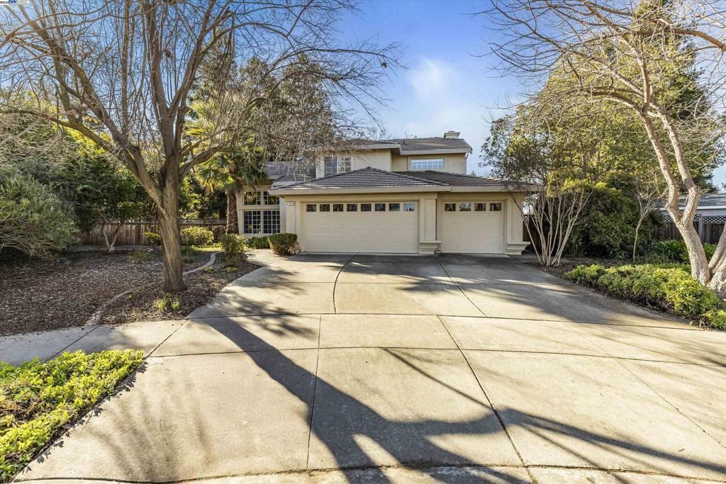 view of front of home with a garage