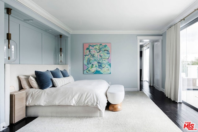 bedroom featuring dark hardwood / wood-style flooring and crown molding