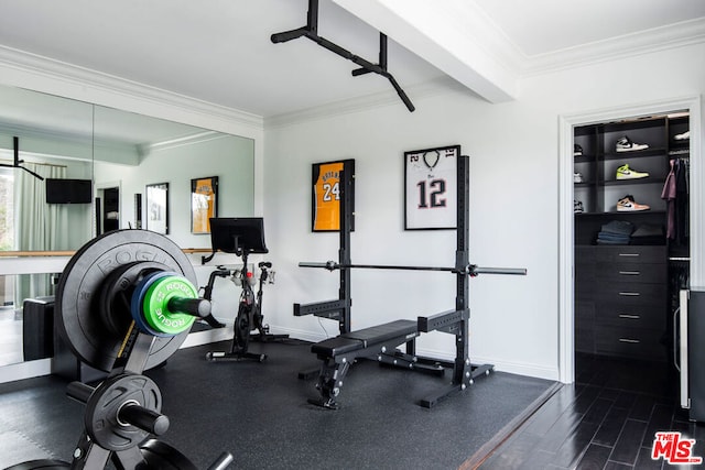 workout area with crown molding