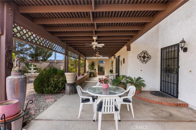 view of patio / terrace featuring ceiling fan