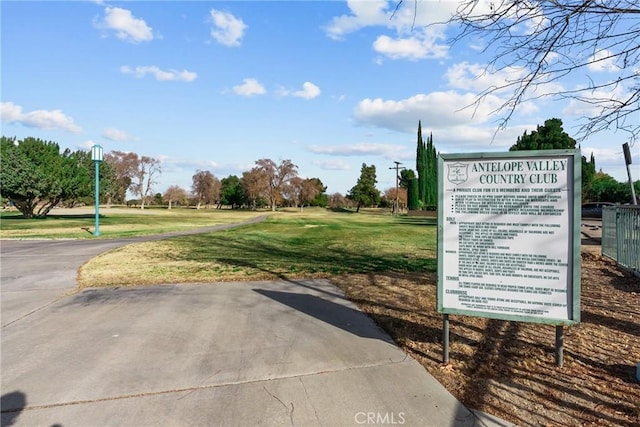 surrounding community featuring a yard