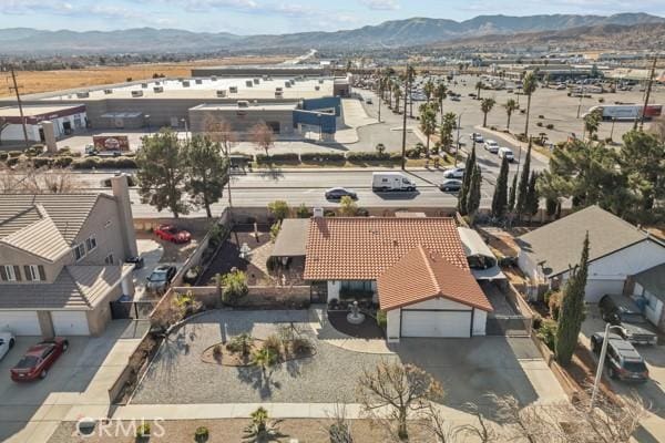 drone / aerial view featuring a mountain view