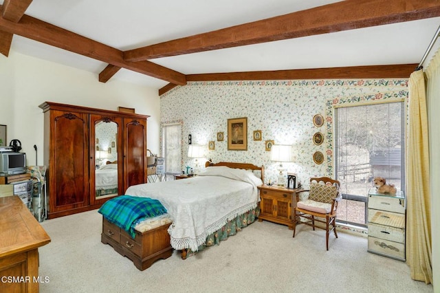 bedroom featuring beam ceiling and light carpet