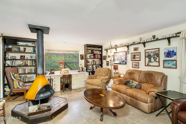 living room with a wood stove