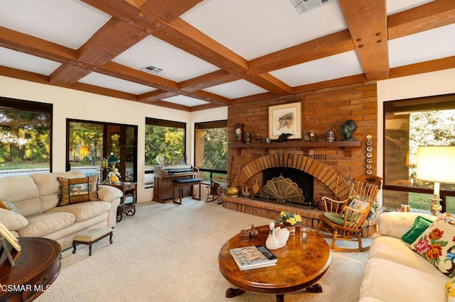 carpeted living room with a brick fireplace, beamed ceiling, and coffered ceiling