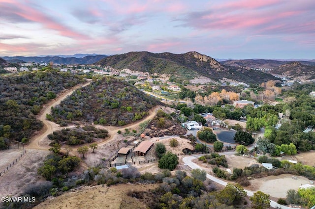 aerial view at dusk with a mountain view