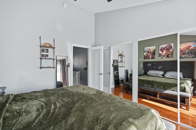 bedroom with a closet and hardwood / wood-style flooring