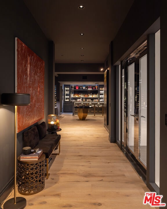 hallway with light wood-type flooring