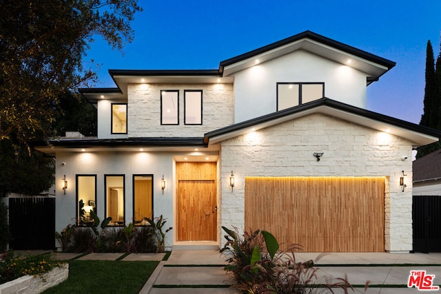 contemporary home featuring a garage