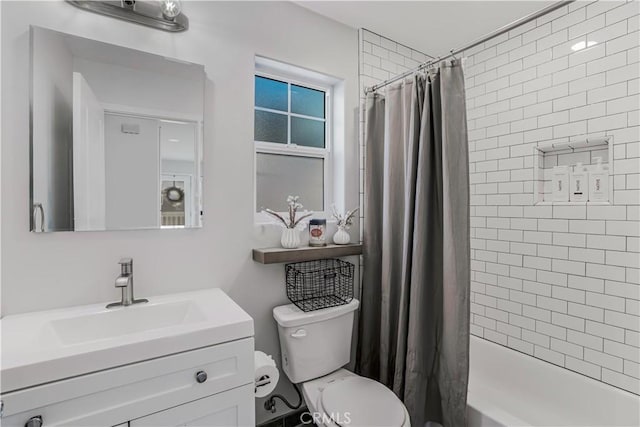 full bathroom with toilet, shower / bath combination with curtain, and vanity