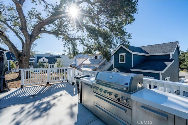 view of patio / terrace with a grill and area for grilling