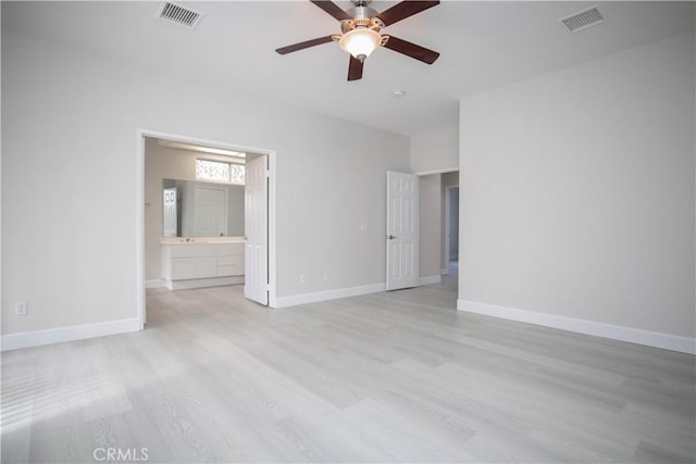 spare room with ceiling fan and light hardwood / wood-style floors