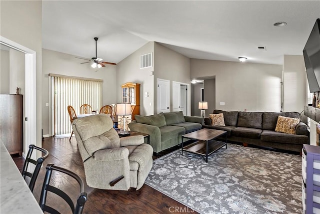 living room with ceiling fan, dark hardwood / wood-style floors, and lofted ceiling