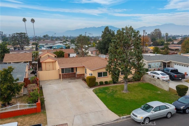 birds eye view of property featuring a mountain view