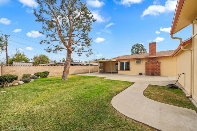 view of yard with a patio area