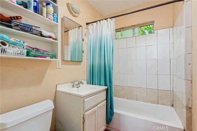 full bathroom featuring toilet, shower / bathtub combination with curtain, and vanity