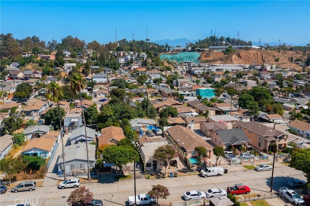 drone / aerial view featuring a mountain view