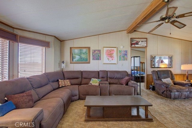 living room with ceiling fan, light colored carpet, and lofted ceiling with beams