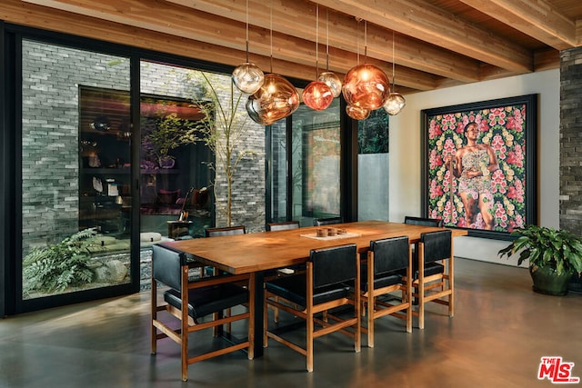 dining space featuring concrete floors, wooden ceiling, and beam ceiling