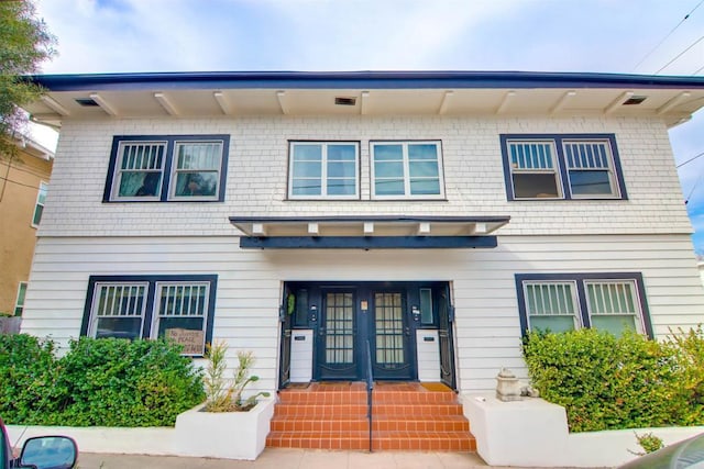 view of front of house with french doors