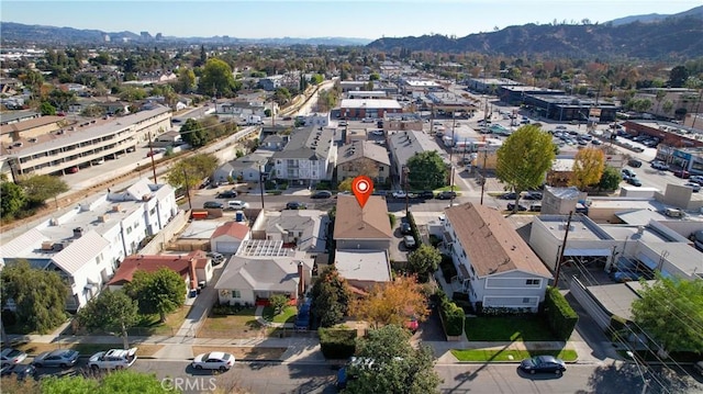 bird's eye view with a mountain view