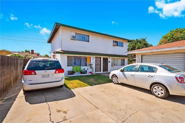 view of front of property with cooling unit