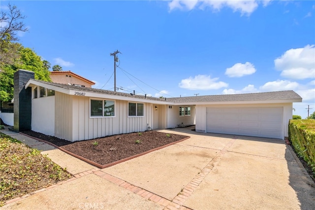 single story home featuring a garage