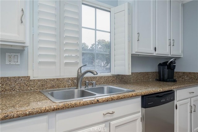 kitchen with sink, stainless steel dishwasher, and white cabinets