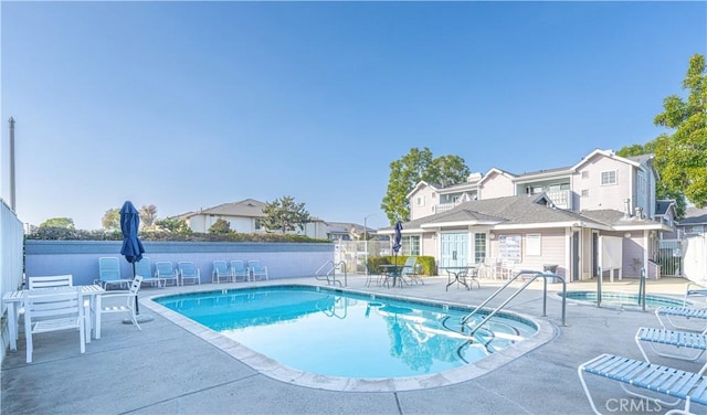 view of pool featuring a patio