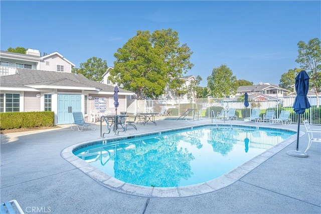 view of pool featuring a patio area