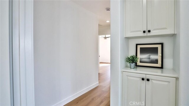 hallway featuring light hardwood / wood-style floors