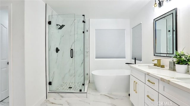 bathroom featuring separate shower and tub and vanity