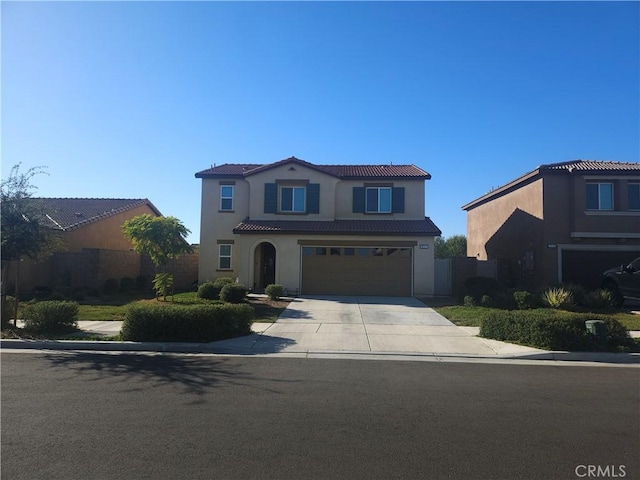 1221 Justice Pl, Hemet, CA 92543 - mediterranean / spanish home featuring a garage, concrete driveway, a tiled roof, and stucco siding