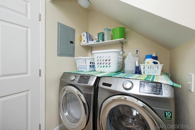 laundry room with separate washer and dryer and electric panel