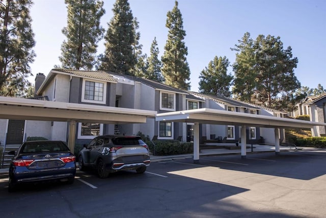 view of front of house featuring a carport