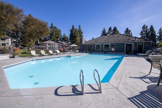 view of swimming pool featuring a patio