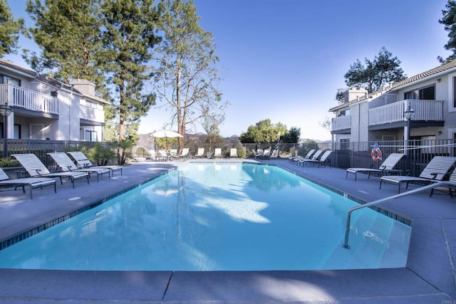 view of swimming pool featuring a patio area