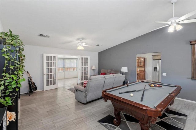 rec room featuring vaulted ceiling, ceiling fan, french doors, and billiards