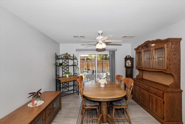 dining area with ceiling fan