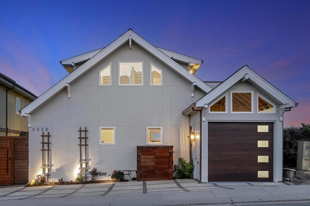 view of front of property with a garage