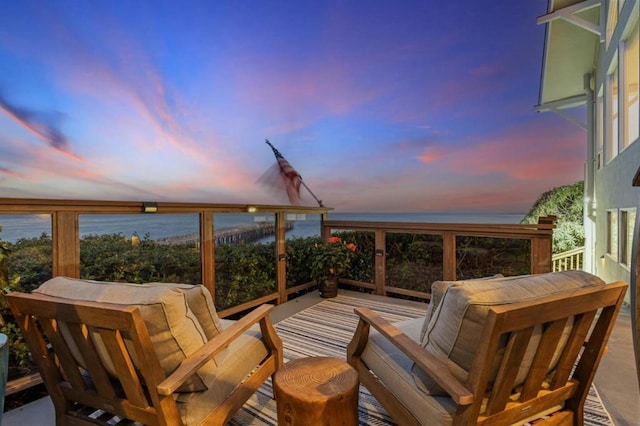 deck at dusk with a water view