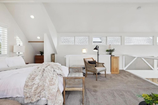 carpeted bedroom featuring vaulted ceiling