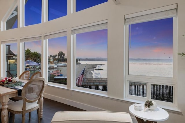 sunroom with a water view