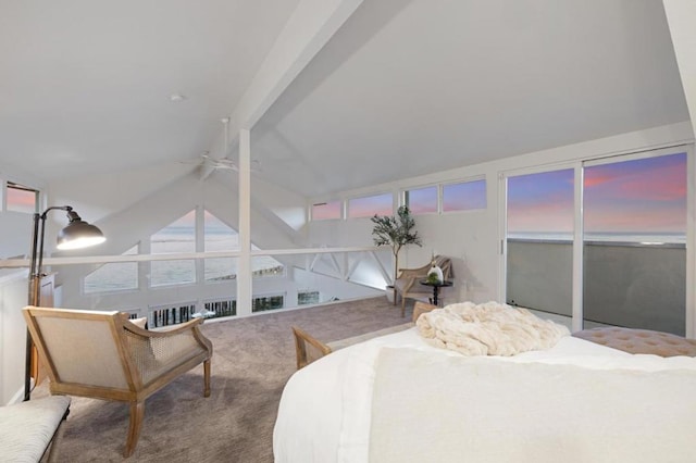 carpeted bedroom featuring lofted ceiling with beams